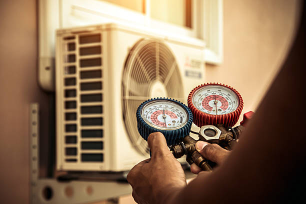 Professional Air Conditioning Service technician working in Dyer, TN